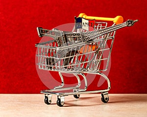 Eiffel tower inside shopping trolley.