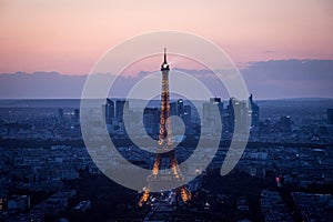 Eiffel tower with its majestic beauty i  paris by sunset in the middle of the city cityscape