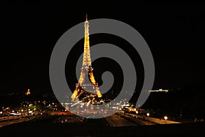 Eiffel Tower light performance show in twilight. Paris, France.