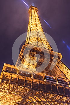 The Eiffel Tower light up at night. Paris France