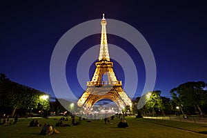 Eiffel Tower in night light, Paris, France.