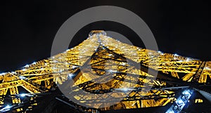 Eiffel Tower in night light, shining, Paris, France.