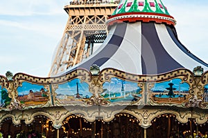 Eiffel Tower with an ornate carousel in the foreground