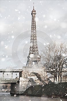 Eiffel Tower in Paris, France in snowstorm