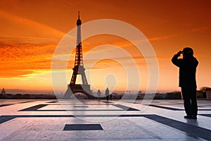 Eiffel tower and photographer silhouette in Paris