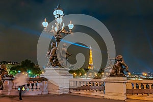 Eiffel tower from Pont Alexandre III at night, Paris, France