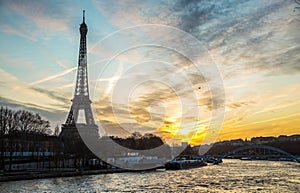 Eiffel tower from the promenade of the Seine at night