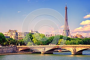 Eiffel tower rising over Seine river, Paris, France