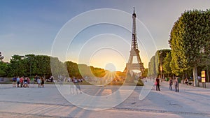 Eiffel Tower seen from Champ de Mars at sunset timelapse, Paris, France