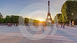 Eiffel Tower seen from Champ de Mars at sunset timelapse, Paris, France