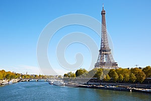 Eiffel tower and Seine river in a clear sunny day