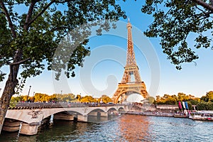 Eiffel tower and Seine river at golden sunset. Travel landmarks in Europe and France