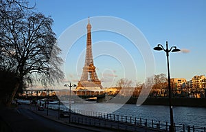 Eiffel Tower on Seine River at sunset