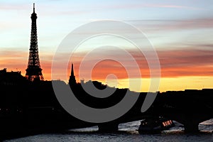 Paris Background with Eiffel tower silhouette at a Parisian orange sunset