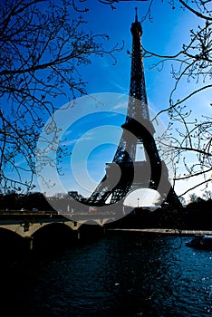 Eiffel Tower silhouette and the rooftops of Paris Paris,France