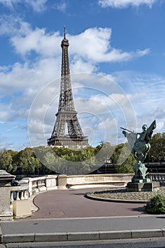 Eiffel tower with Statue of La France Renaissante, Paris, France