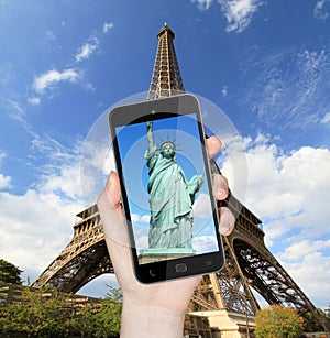 Eiffel Tower and statue of liberty taken with mobile phone