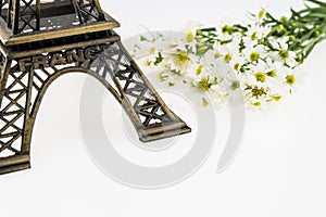 Eiffel Tower Statue with White cutter flower, Name of Science As