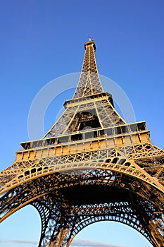 Eiffel Tower on sunny day with clear blue sky background