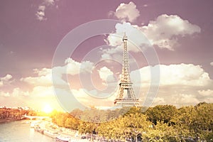 Eiffel tower sunset with clouds.