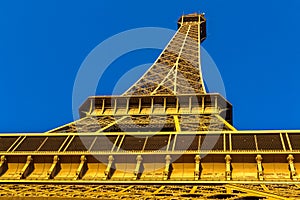 Eiffel Tower view from Champ de Mars. Paris, France