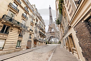 Eiffel Tower view in Paris from a small street