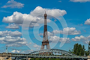 The Eiffel Tower is a wrought-iron lattice tower on the Champ de Mars in Paris