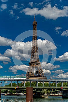 The Eiffel Tower is a wrought-iron lattice tower on the Champ de Mars in Paris