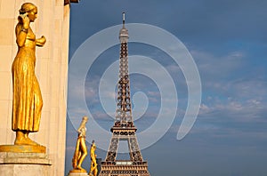 Eiffeltower in Paris with golden statues