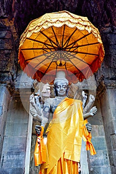 Eight-armed statue of the Hindu God Shiva inside Angkor Wat, Siem Reap, Cambodia