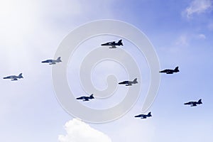 Eight jet fighters making formation for demonstration