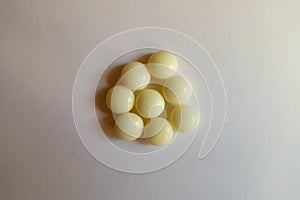 Eight light yellow mints of xylitol