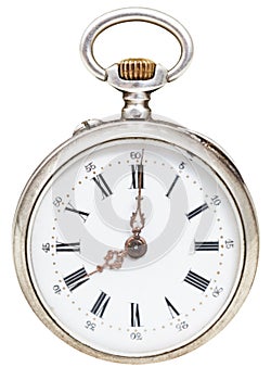 Eight o'clock on the dial of retro pocket watch