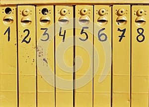 Eight old mail boxes