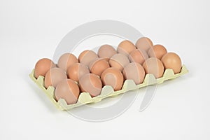 Eighteen eggs in a carton