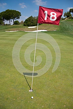 Eighteen hole of a golf course photo