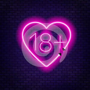 Eighteen plus neon sign on brick wall background.