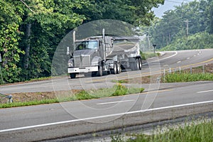 Eighteen Wheeler Travels On Rural Secondary Highway