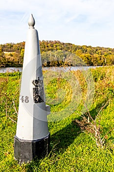 Eijsder Beemden nature reserve with an border marker between Belgium and Holland