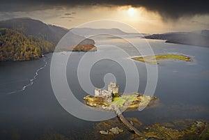 Eilean Donan castle aerial view from above at sunrise