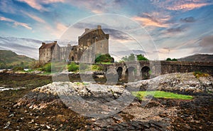 Eilean Donan Castle with at dramatic sunset, Scotland