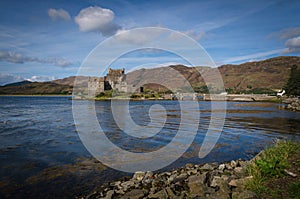 Eilean Donan Castle on Loch Duich in a summer day with blue sky, Highland, Scotland, United Kingdom