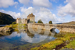 Eilean Donan castle and bridge from scenic lookout Scotland photo