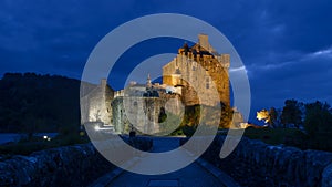 Eilean Donan Castle Sotland landmark Scottish old fortress clouds