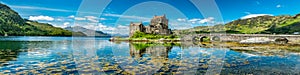 Eilean Donan Castle during a warm summer day - Dornie, Scotland photo