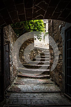 Passage in the old town of Suvereto, Tuscany, Italy photo