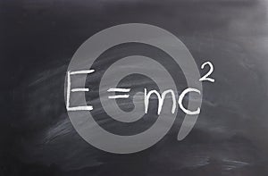 Einstein formula written on a chalkboard