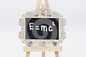 Einstein's general relativity formula written with chalk on a blackboard