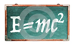 EinsteinÂ´s relativity theory E=mc2 equation mass energy equivalence on green old grungy vintage wide wooden chalkboard