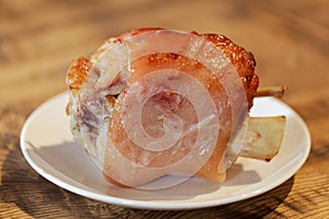 Eisbein pickled ham hock on a white plate